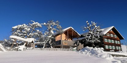 Urlaub auf dem Bauernhof - Mithilfe beim: Tiere füttern - Schnepfau - Winter am Wiesenhof - Wiesenhof Rusch