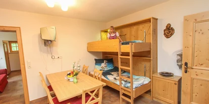 nyaralás a farmon - Art der Unterkunft: Gasthaus - Bsuch - Essbereich und Kinder-betten im Appartment - MILLINGHOF