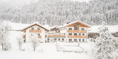 Urlaub auf dem Bauernhof - Mithilfe beim: Tiere füttern - Südtirol - Winteransicht Untermairhof - Untermairhof