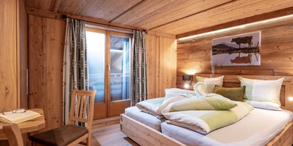 Urlaub auf dem Bauernhof - Art der Unterkunft: Appartement - Schlafzimmer 1 - FeWo Alpenrose - Erbhof "Achrainer-Moosen"