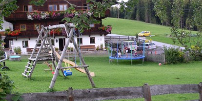 Urlaub auf dem Bauernhof - ideal für: Pärchen - Tiroler Unterland - Viel Platz zum Spielen und Genießen direkt am Haus - Erbhof "Achrainer-Moosen"