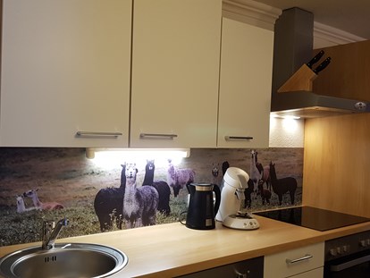 Urlaub auf dem Bauernhof - Aufenthaltsraum - Modern ausgestattete Küche - Reiterhof Alpin Appart