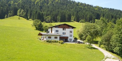 vacation on the farm - Tiere am Hof: Kühe - Tiroler Unterland - Appartementhaus Fischbacher - Großwolfing
