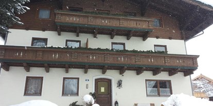 Urlaub auf dem Bauernhof - Salzburger Sportwelt - Hauseingang Winter - Schnell Palfengut