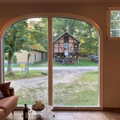 Vakantieboerderij - Blick aus dem Appartement "Im Gutshaus" - Gut Rehrhof