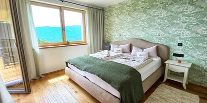 Urlaub auf dem Bauernhof - ideal für: Pärchen - Aichforst - Schlafzimmer Berg-See-Suite - Bio- und Vitalbauernhof Bacherhof