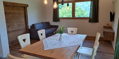 Urlaub auf dem Bauernhof - Eislaufen - Trentino-Südtirol - Wohnküche der Wohnung Vinea - Pignathof 