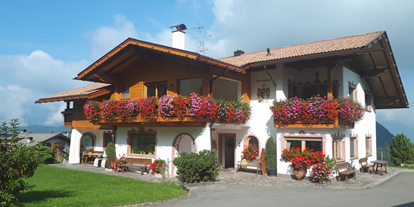 Urlaub auf dem Bauernhof - Fahrzeuge: Heuwender - Italien - Binterhof Haus - Binterhof