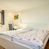 Agriturismo - Schlafzimmer Ferienwohnung "Seeblick - Innauer Hof
