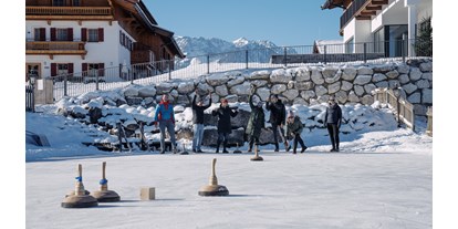 Urlaub auf dem Bauernhof - Jahreszeit: Frühlings-Urlaub - Tirol - Eisstockschießen - Feriengut Unterhochstätt