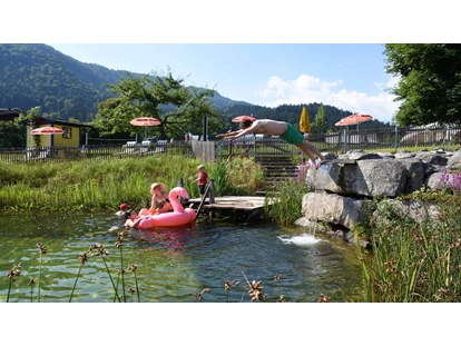 Urlaub auf dem Bauernhof - Schwimmmöglichkeit: Schwimmteich - Petting - Schwimmteich - Feriengut Unterhochstätt
