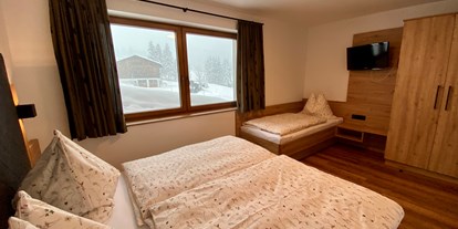 vacanza in fattoria - Terrasse oder Balkon am Zimmer - Hütten (Leogang) - Schlafzimmer - Appartement 1 - Finkhof Appartements