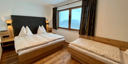 Urlaub auf dem Bauernhof - ideal für: Pärchen - Lacken (Taxenbach) - Schlafzimmer - Appartement 1 - Finkhof Appartements