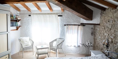 nyaralás a farmon - Schwimmmöglichkeit: Außenpool - Schlafzimmer des Hexenhäuschen - Agriturismo Casa Bivignano - Toskana
