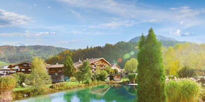 Urlaub auf dem Bauernhof - Schwimmmöglichkeit: Innenpool - Tirol - Familienglück und Urlaubsfreude im Sommer - Familotel Landgut Furtherwirt