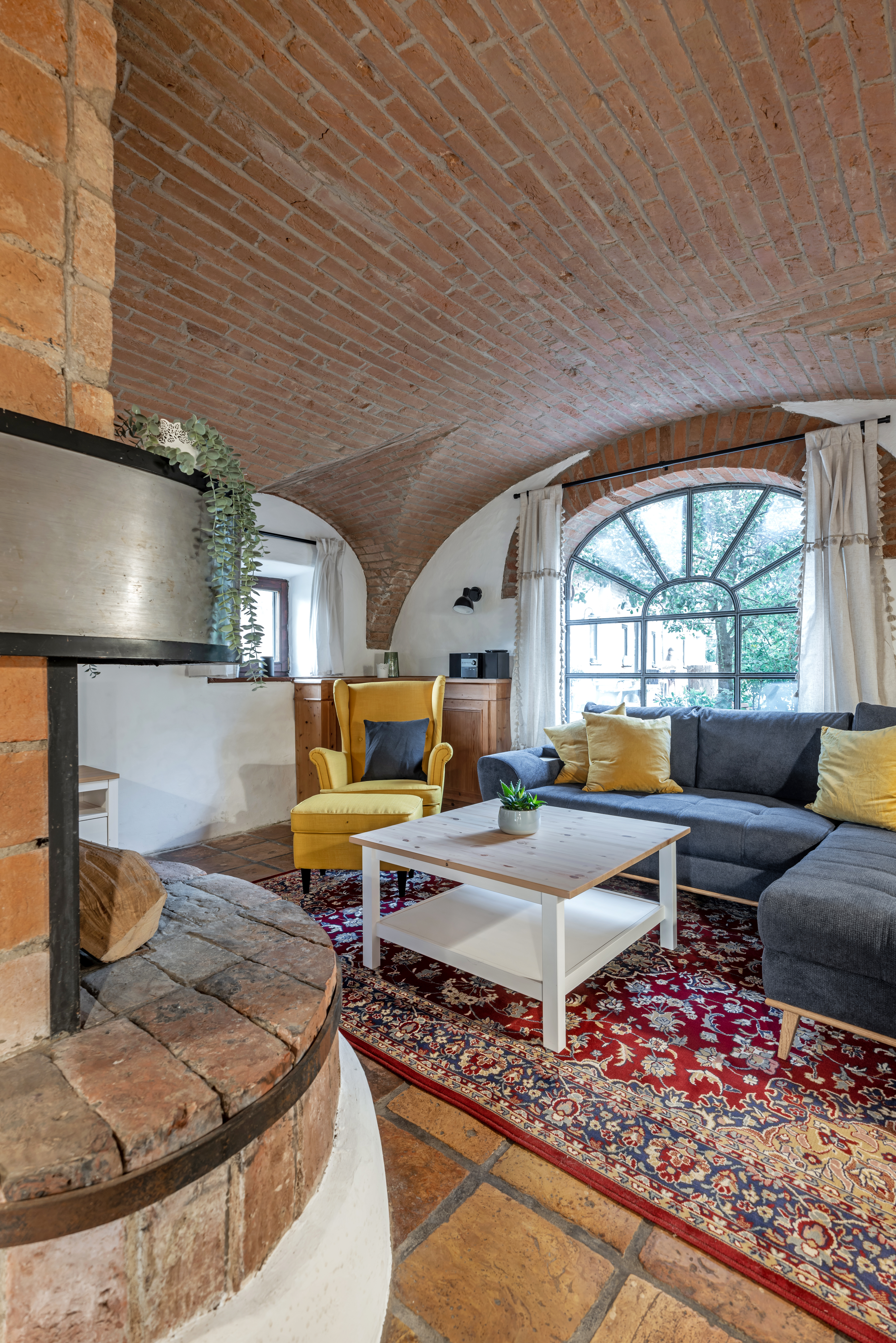 Ferien Bauernhof: Wohnzimmer mit offenem Kamin Ferienhaus Stoi - Ferienhof Schmelcher