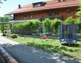 Ferien Bauernhof: Spielplatz - Ferienhof Landhaus Guglhupf