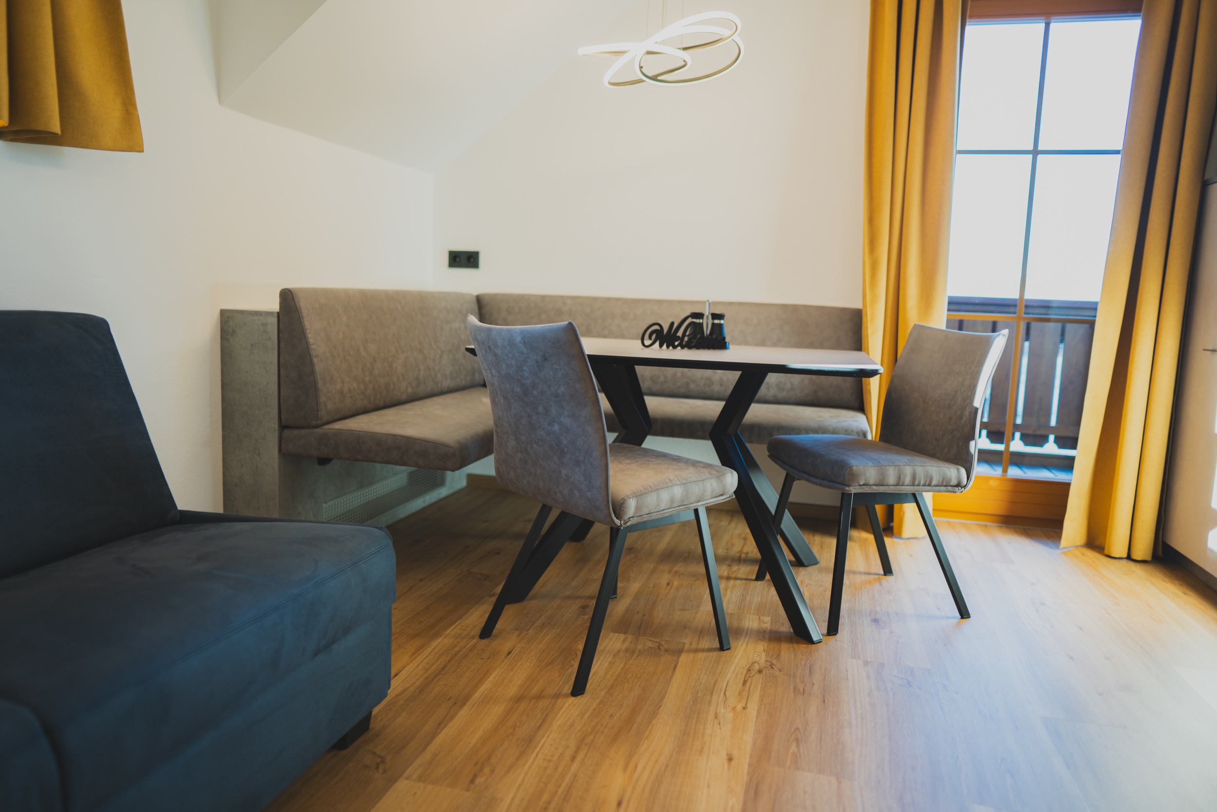 Ferien Bauernhof: Sitzecke - Chalets und Apartments Hauserhof