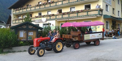 Urlaub auf dem Bauernhof - inklusive Traktorfahrt - Reiterhof Alpin Appart Sommer Familien Paket 2E+1K