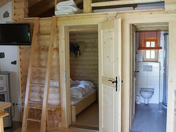 Camping Lindlerhof am See - Ferienhäuser - Almhütten - Restaurant Vorstellung der Zimmer Ferienhaus