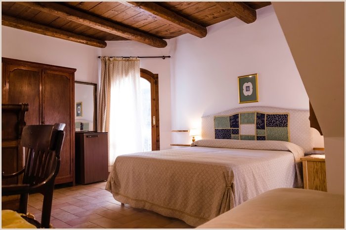 Agriturismo La Campana Presentatie van de kamers Driepersoonskamer